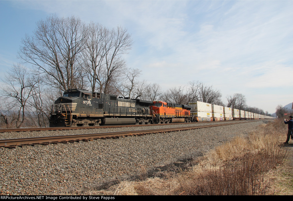 NS 9724 and BNSF 7185 with a westbound stack train